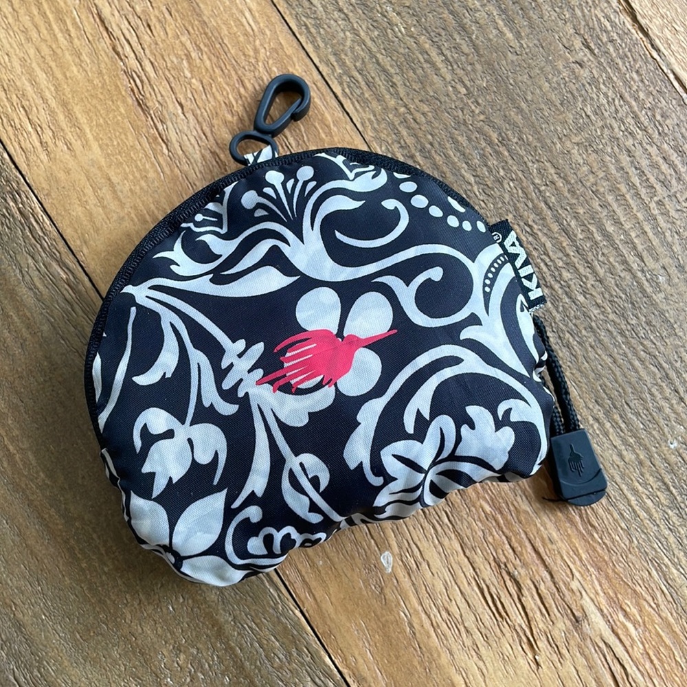 Kiva travel hat that folds into a nifty zippered pouch for easy transport